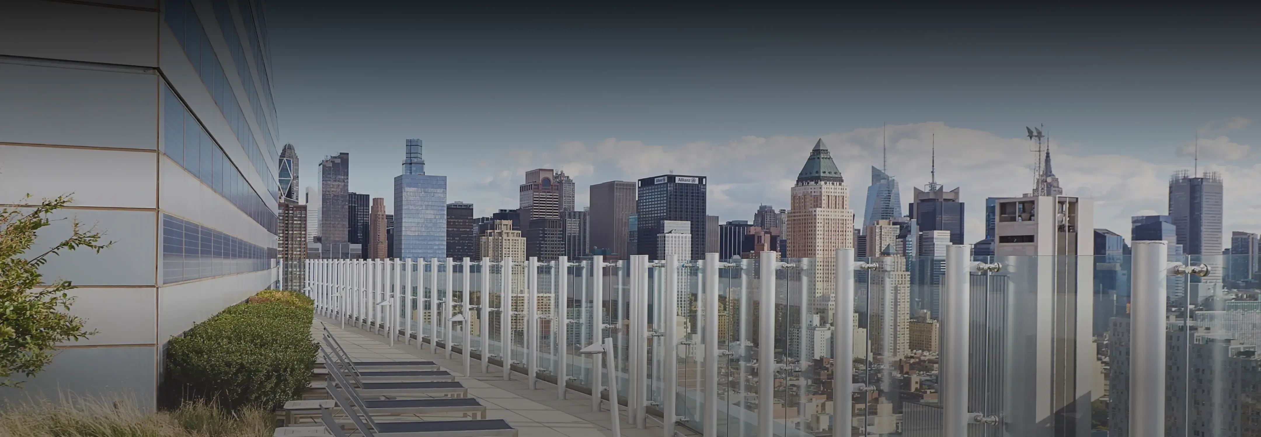 Rooftop view from Helena 57 West with a clear sightline over the urban landscape, showcasing a mix of traditional and modern architecture.